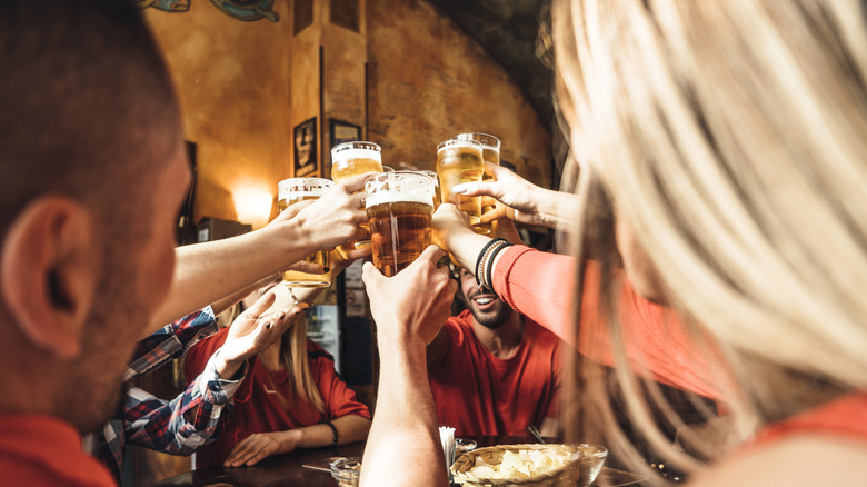 Friends at pub drinking beer