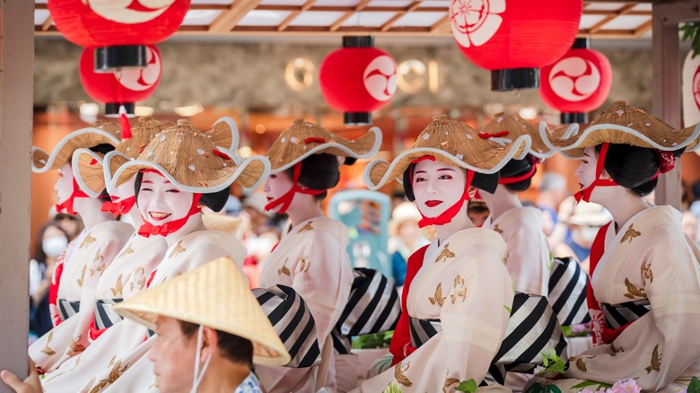 Smiling geisha at Gion Matsuri in Kyoto