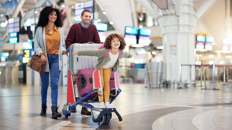 Family going through airport