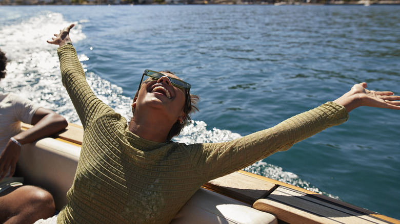 Woman smiling on a boat