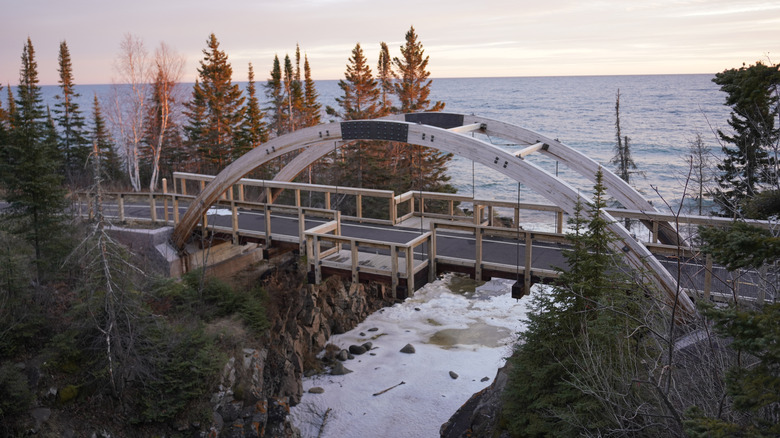 A bridge over a frozen section of Lake Superior in Grand Marais