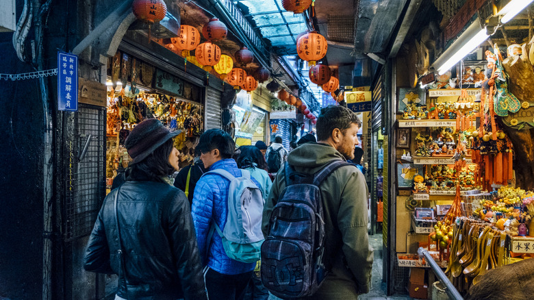 People walking through a night market