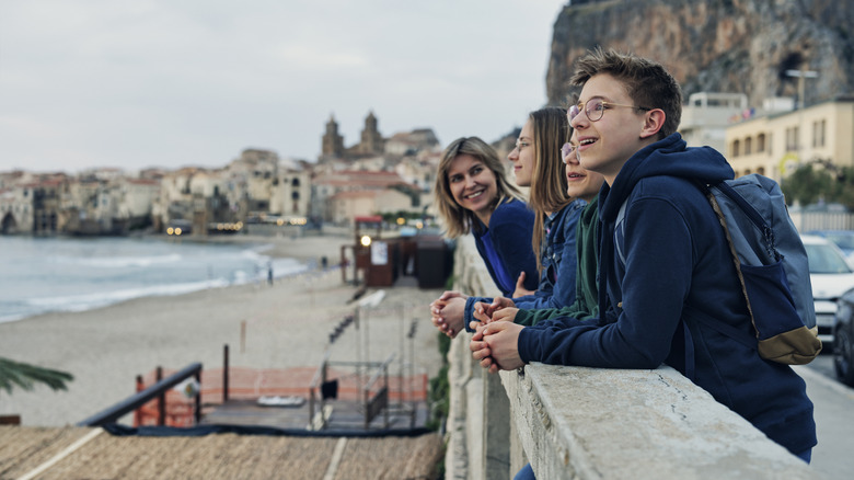 Family with teens visiting a country during off season