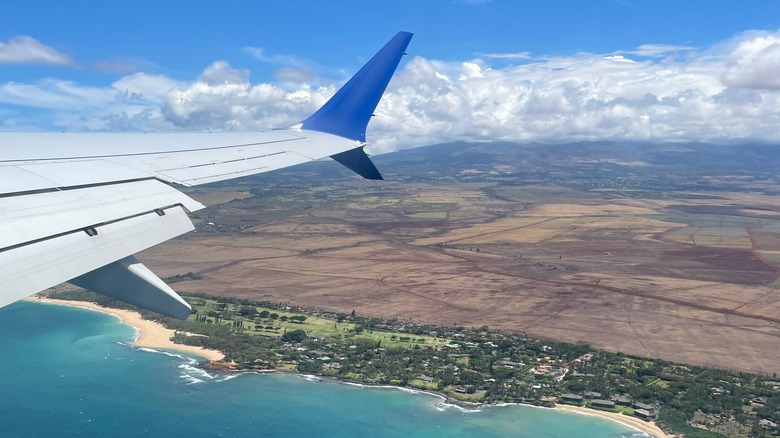 Plane flying over Maui, Hawaii