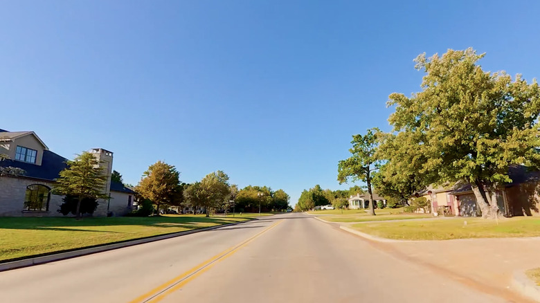 Verdant residential street in Nichols Hills