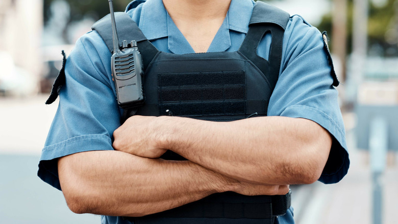 Security guard crossing arms