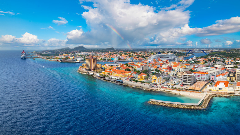 The colorful town of Willemstad, Curacao and blue waters