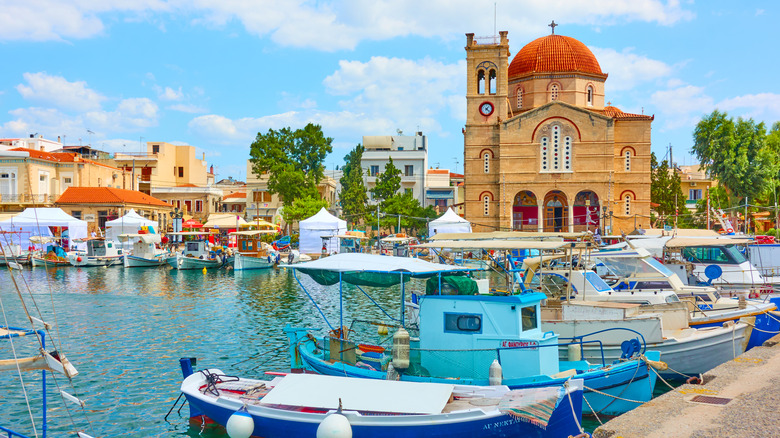Church and fishing boats in Aegina, Greece