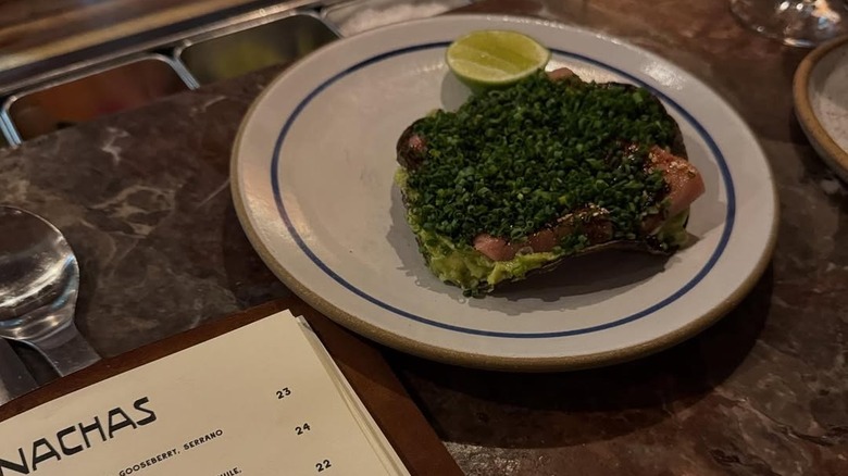 A meal and menu at Mezcaleria Alma