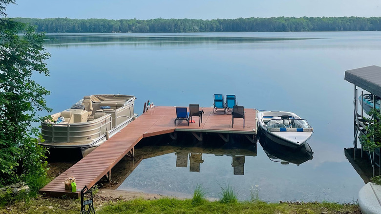 Two boats and a dock on Black Oak Lake in Land O' Lakes, Wisconsin