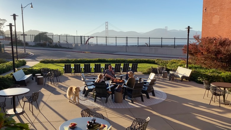 View of the Golden Gate Bridge and the fire pit at the Lodge at the Presidio