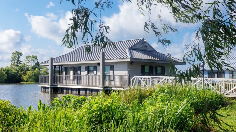 A floating cabin at Bayou Segnette State Park overlooks the canal.