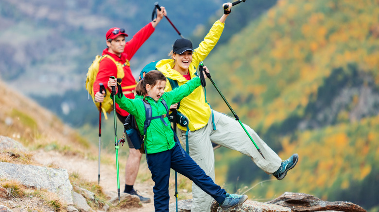 Family in bright colors hiking
