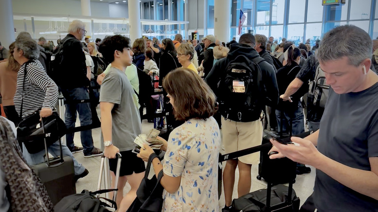 People clearing customs at JFK airport