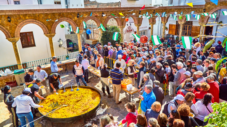 Crowds celebrate National Paella Day in Spain