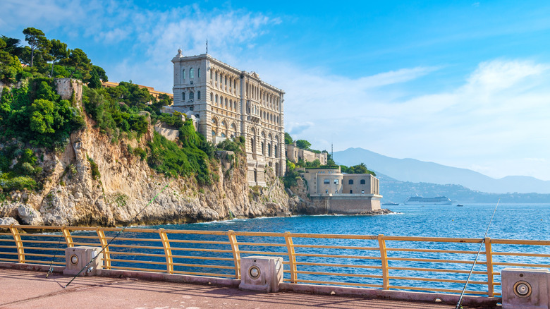 The Oceanographic Museum of Monaco, built into the cliff, as seen from a walkway across the water