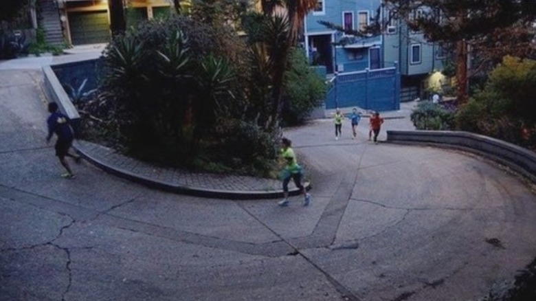 Joggers on a hairpin curve on Vermont street in San Francisco