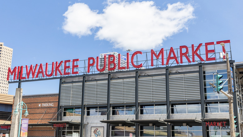 Signage outside Milwaukee Public Market in daylight