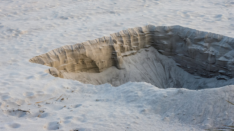 Sand hole at beach 