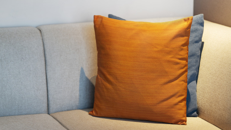 Hotel room sofa with throw pillows