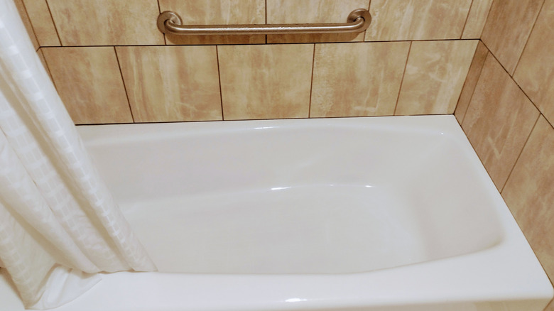 Hotel room bathtub and shower curtain