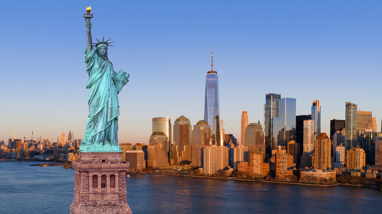 The Statue of Liberty in front of the New York skyline