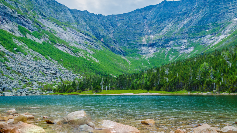Clear water of Chimney Pond surrounded by Mount Katahdin in Baxter State Park
