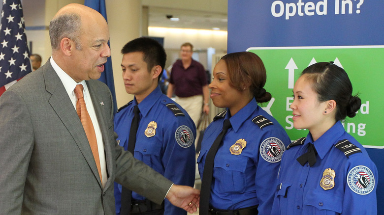 TSA agents in line