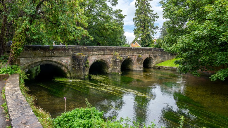 Ancient stone arch bridge crossing the River Avon, Salisbury, England