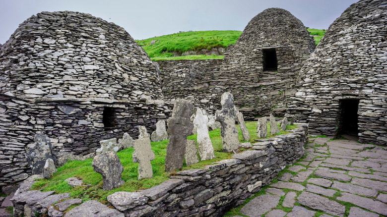 The clocháns (stone beehive-shaped living spaces), graveyard markers, and other monastic ruins from the ancient settlement on Skellig Michael island in County Kerry, Ireland
