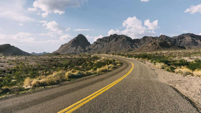 Historic Route 66 in Arizona through some rocky outcrops and open desert