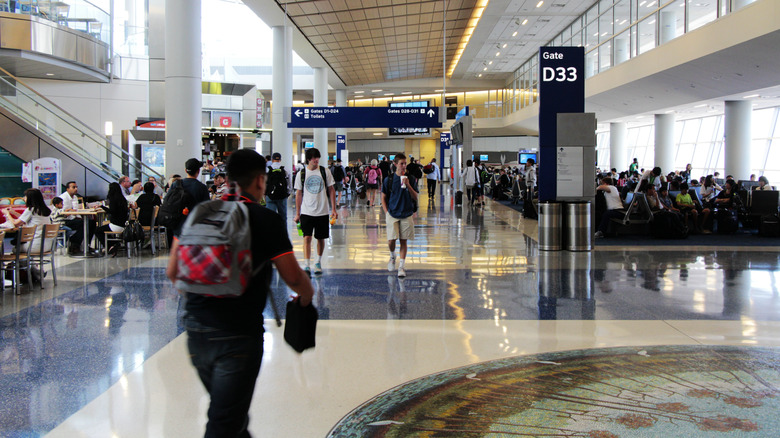 Travelers waiting for their flight at DFW airport