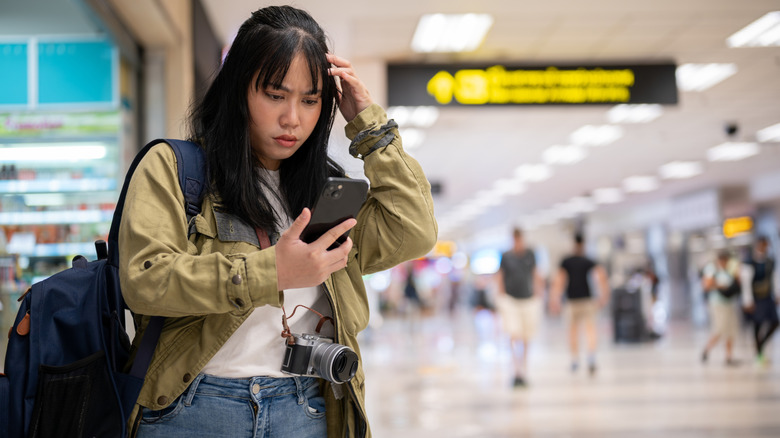A solo traveler confused at an airport