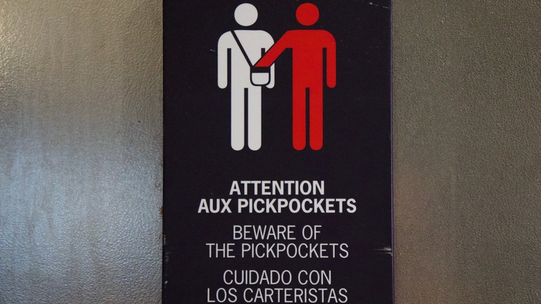 Parisian sign warning people to beware of pickpockets