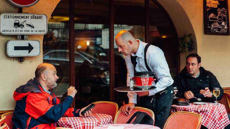 Conversation at French café