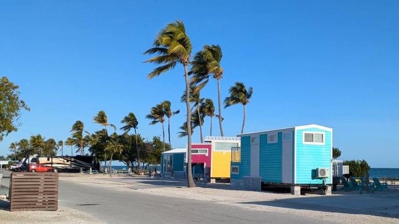 An image of colorful RVs at Tiny House Village in Key West in Florida