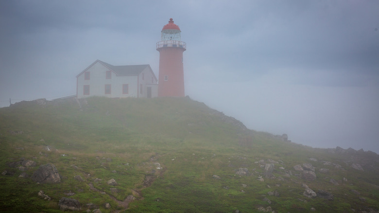 The Ferryland Head Light surrounded by fog on the Avalon Peninsula