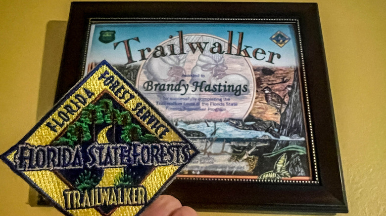 Certificate and patch rewards from Florida State Forest Trailwalker Program