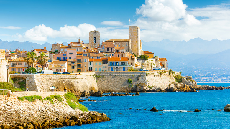 Antibes old town standing next to bright blue riviera water