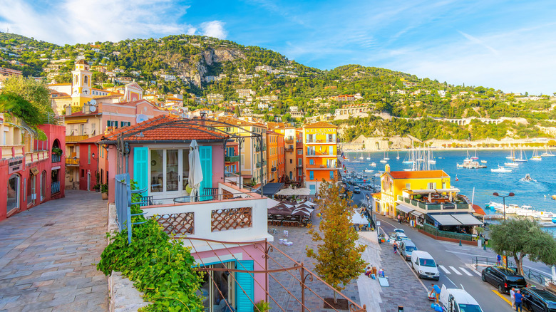 The sun hits buildings on the seafront of Villefranche-sur-Mer