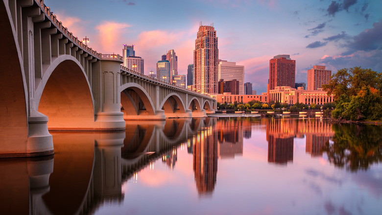 Downtown Minneapolis with reflection of the city skyline in Mississippi River