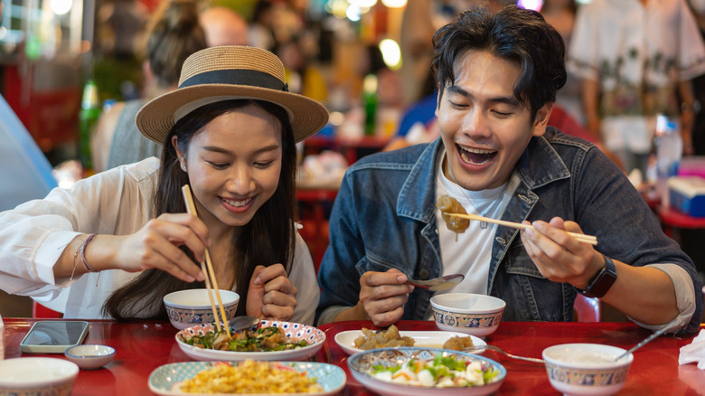 A couple eating at a restaurant