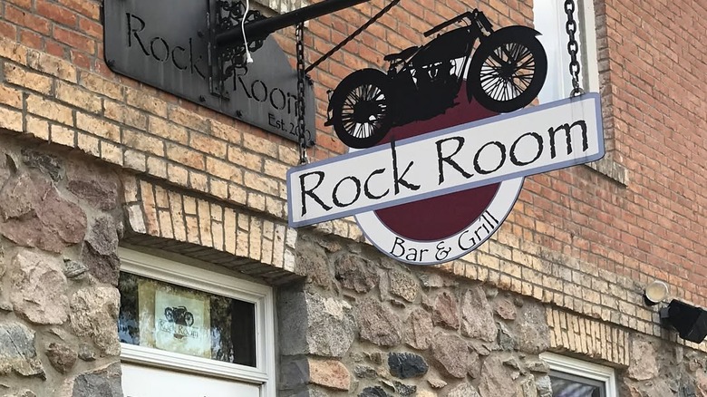 The sign for Rock Room Bar & Grill at Buffalo Ridge Resort and Spa