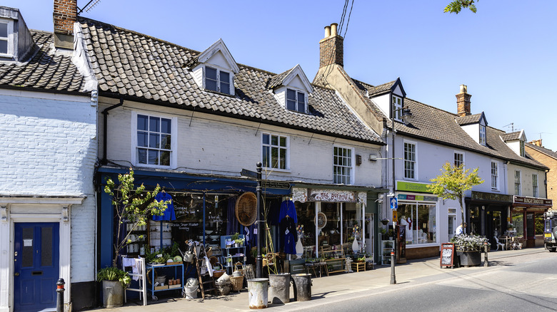 Store fronts lining a street in the town of Beccles in Suffolk County, England