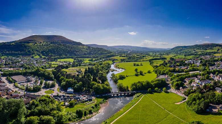 Green mountains and rivers surround the Welsh town of Abergavenny