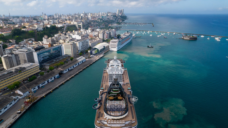 A cruise ship docking in a port