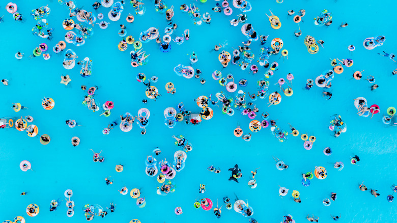 Overhead view of a crowded swimming pool