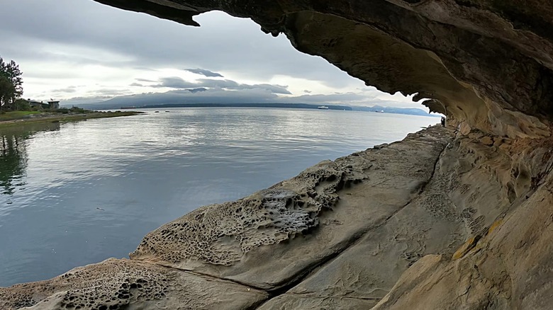 Carved sandstone path overlooking calm water