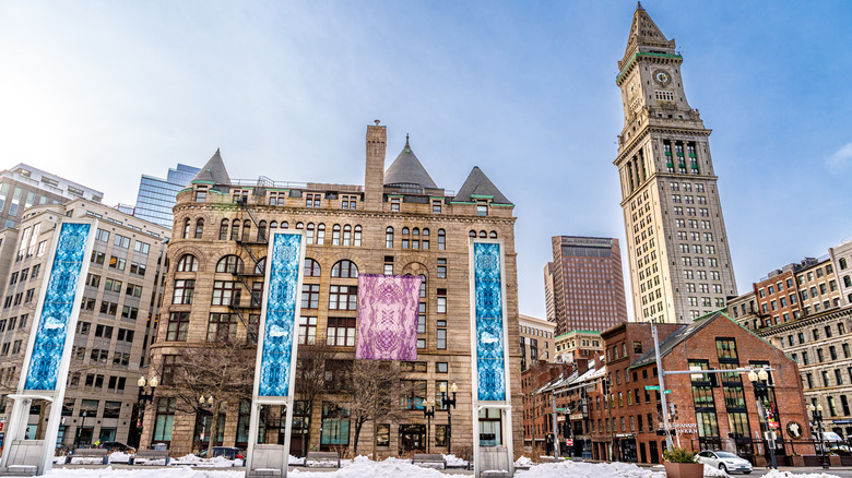 Boston's financial district in winter with setting snow