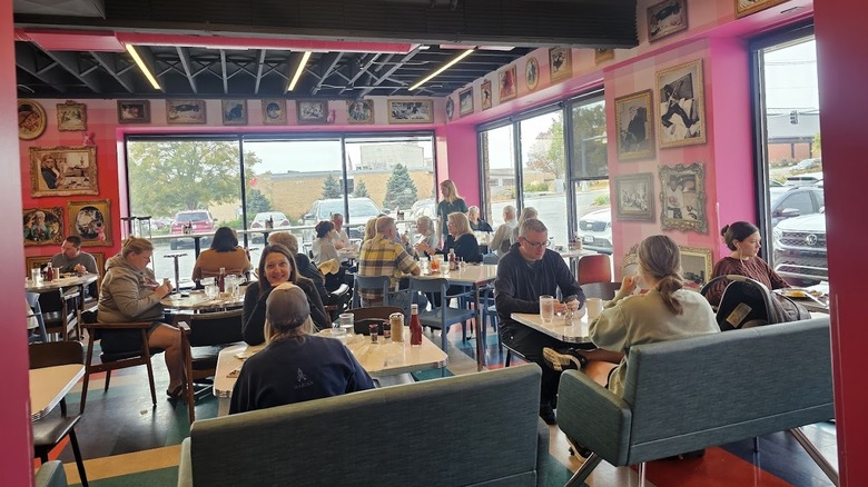 People eating inside dining room at Saddle Creek Breakfast Club